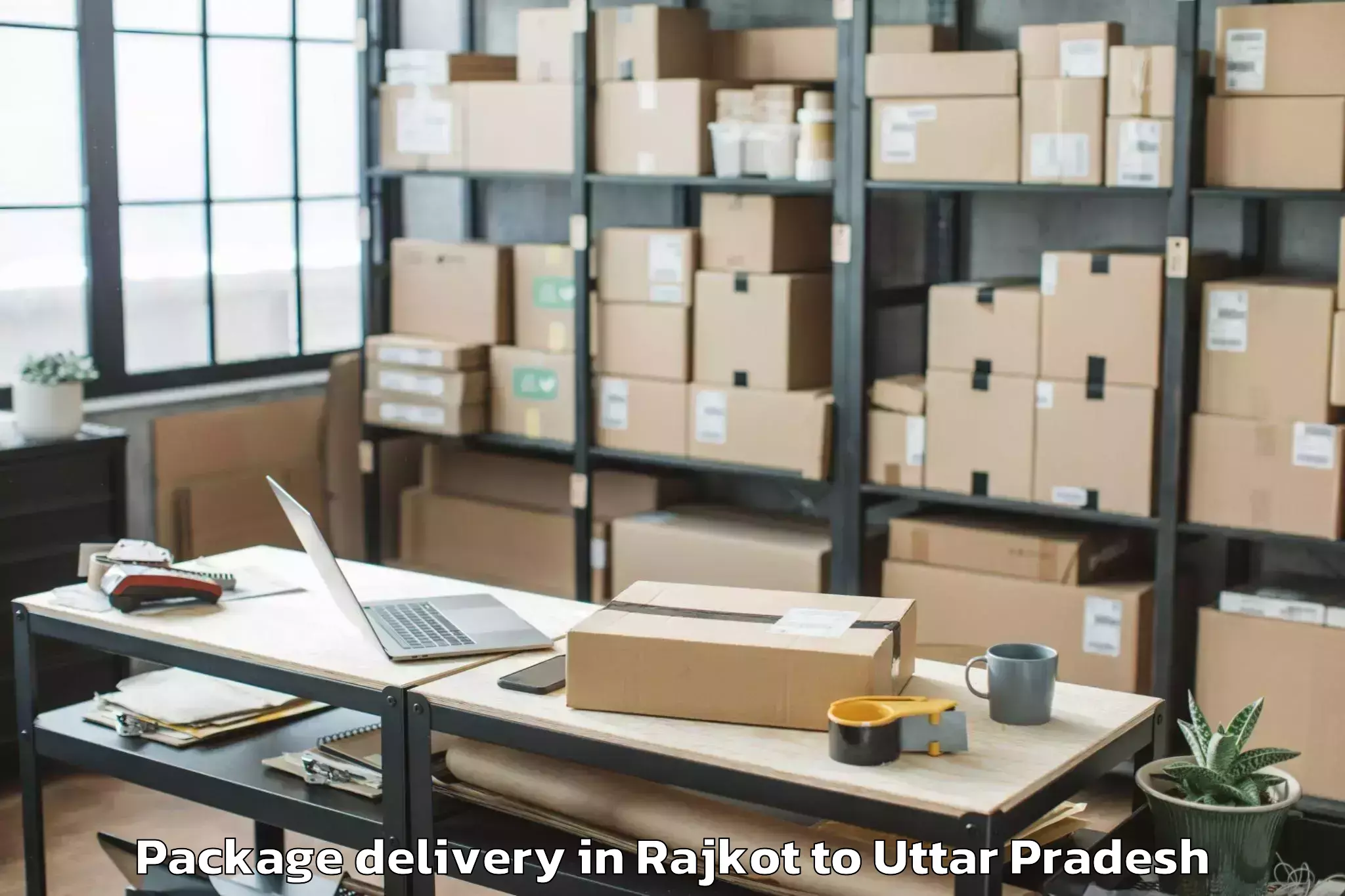 Trusted Rajkot to Phaphund Package Delivery